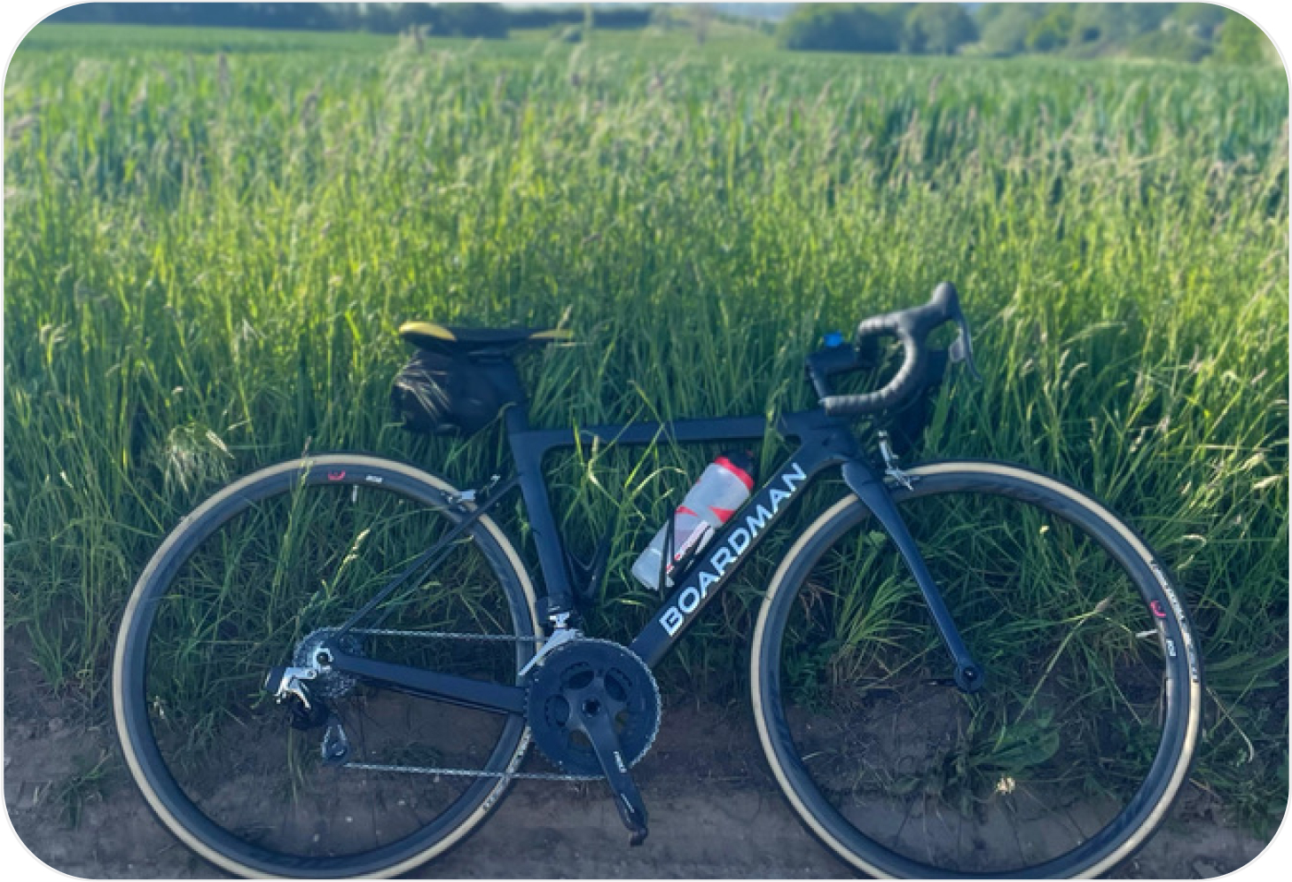 My road bike beside a field